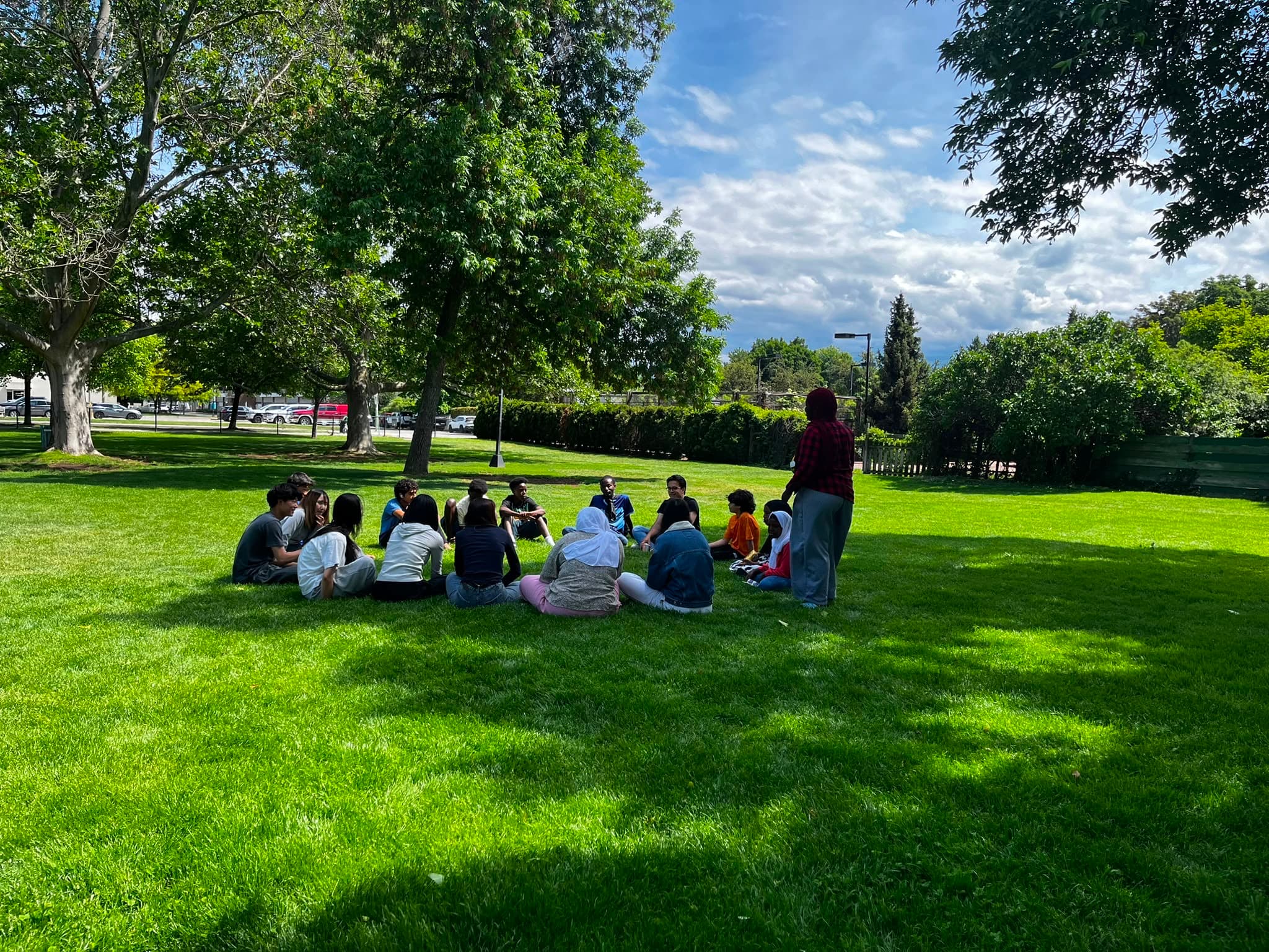 Youth gathered together at a community camp